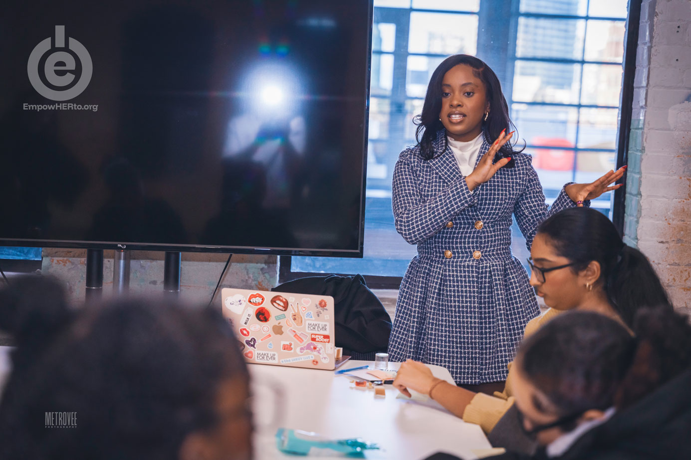 Young women connecting at EmpowHERto event