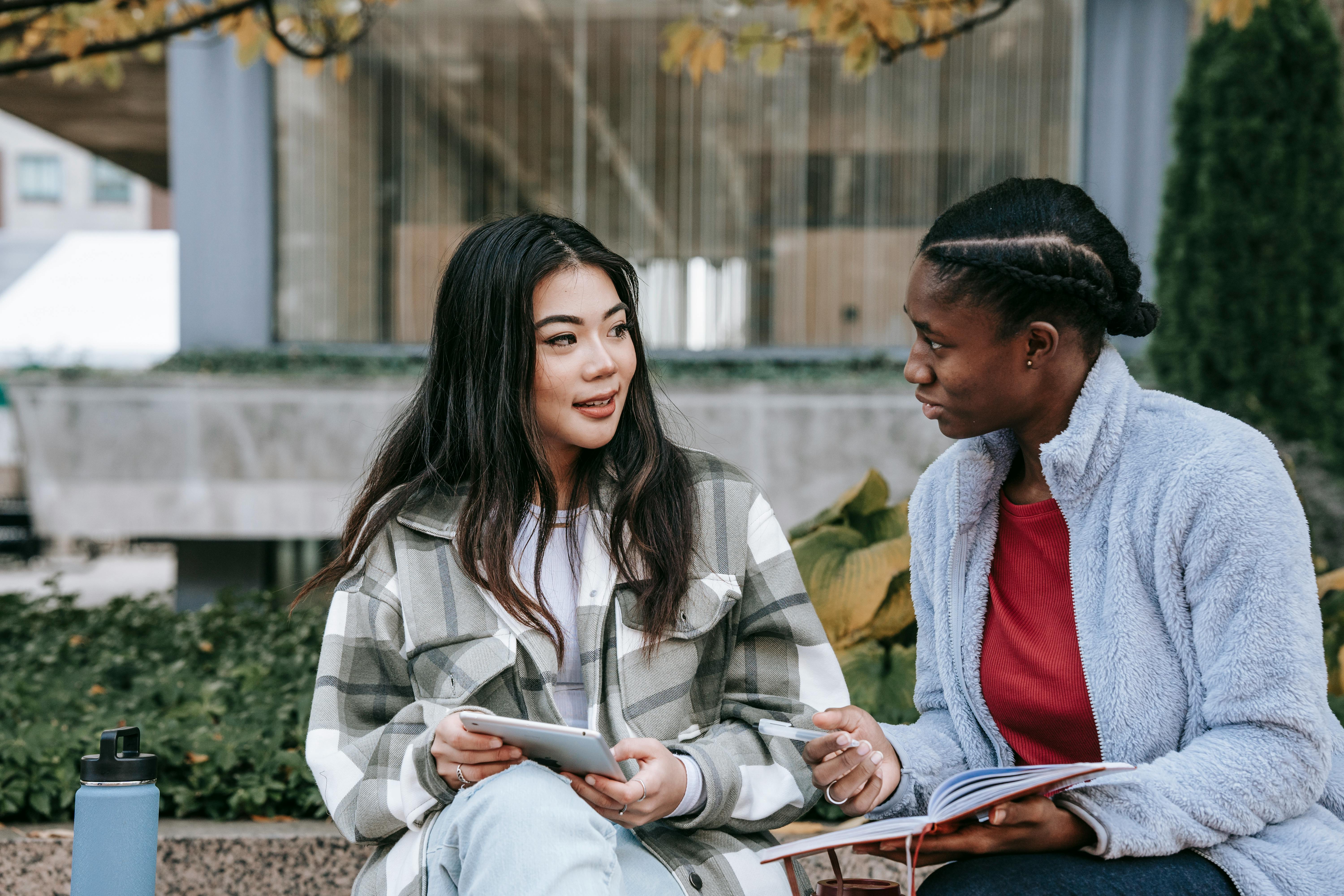 Young women collaborating in a community space