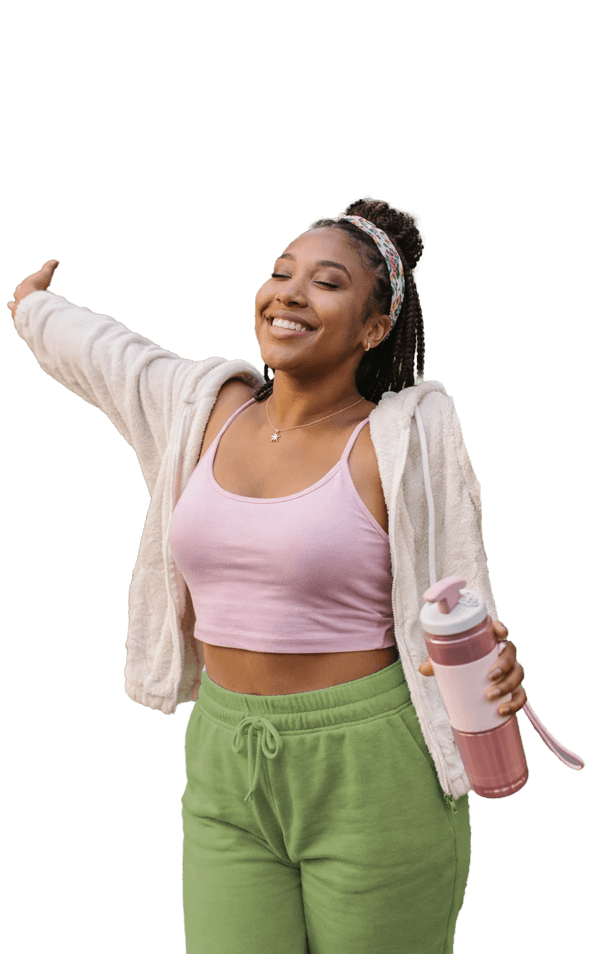 Young woman smiling and celebrating her wellbeing